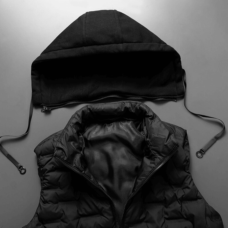 Black quilted men's vest with detachable hood, featuring zippers for a sleek, sporty look, perfect for outdoor activities.